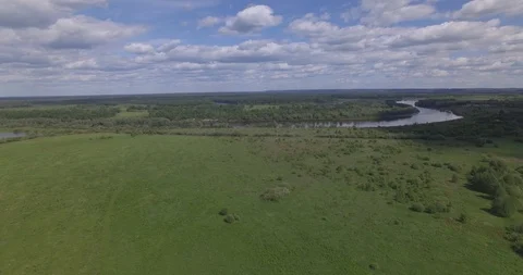 Ascending fly over river fields 스톡 동영상 108749850