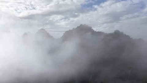 Ascending Forward Drone Shot of Sea of Clouds and Suspension Bridge, Korea Stock Footage 345867452