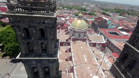 Ascending FPV Drone Shot Climbing Up The Front Stone Wall of Puebla Cathedral Stock Footage 342539574