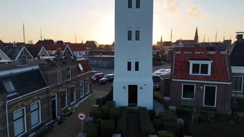 Ascending orbit from lighthouse base to rooftop sea view Stock Footage 331842035