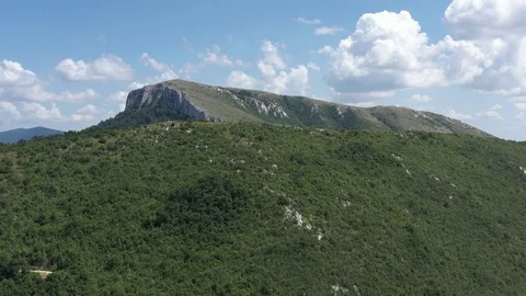 Ascending over the forest of Stol mountain by summer day 4K aerial video Stock Footage 121623831