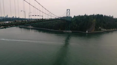 Ascending over Lions Gate bridge Stock Footage 248476671