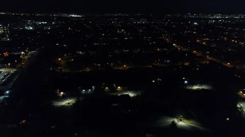 Ascending Over Neighborhood Houses City Skyline At Night Aerial With City Lig Stock Footage