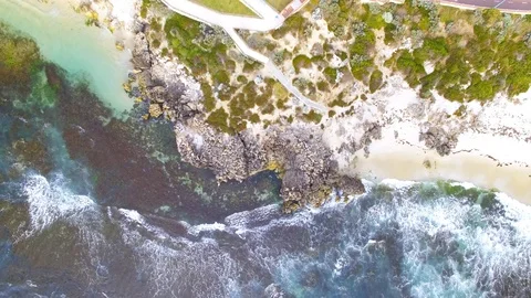Ascending over an ocean beach with reef aerial footage Stock Footage 98188489