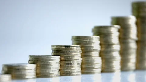 Ascending Piles Of Metallic Coins Stock Footage 74167260