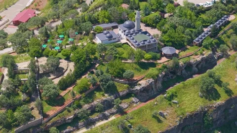 Ascending Pullback from a Historic Hilltop Mosque and Ancient Landscape Stock Footage 341027505