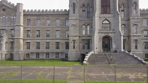 Ascending shot of abandoned sanitarium Stock Footage 80403293