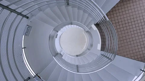 Ascending Shot Of a Drone Flying In The Middle Of Spiral Staircase - Stock Footage 156428706