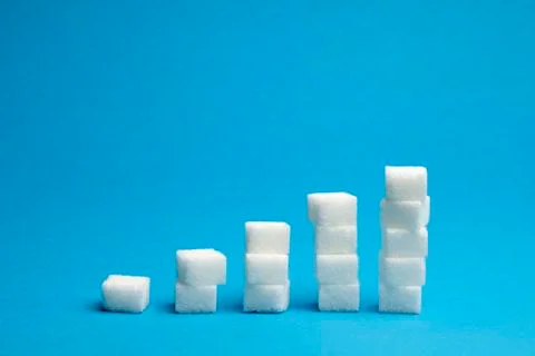 Ascending stacks of sugar cubes Stock Photos