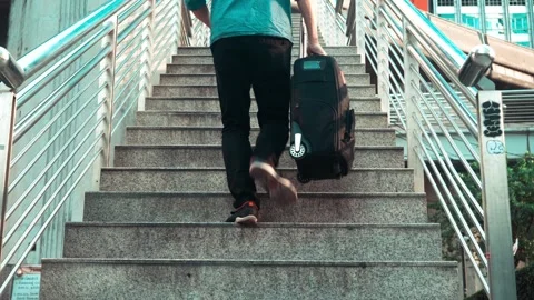 Ascending Stairs with a Backpack Stock Footage 314665917