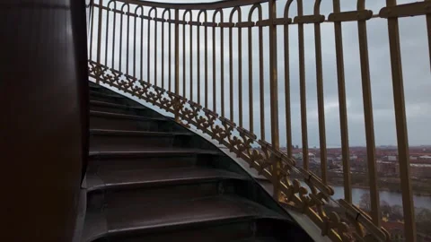 Ascending the steep external spiral spire staircase in Copenhagen Stock Footage 337148880