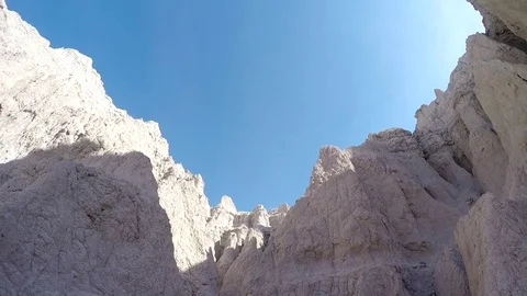 Ascending through crevice in the Badlands Video stock 81765164