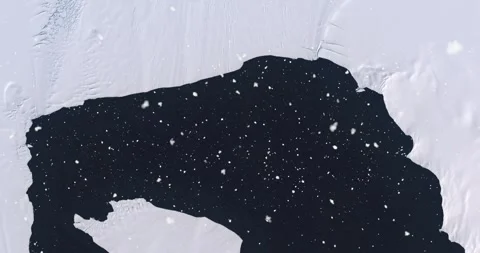 Ascending through falling snow over Pine Island Glacier, Antarctic. Two versions Stock-Footage 268294577