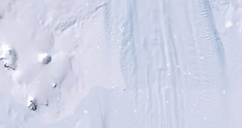 Ascending through falling snow over Pine Island Glacier, Antarctic. Two versions Stock-Footage 268294587