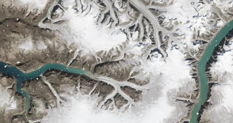 Ascending through falling snow over Sirmilik National Park, Canada. Two versions Stock Footage 268294588