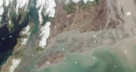 Ascending through falling snow over Copper River delta, Alaska. Two versions Stock Footage 268296513