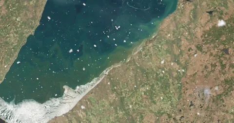 Ascending through falling snow over westernmost end, Lake Superior. Two versions Stock Footage 268296523