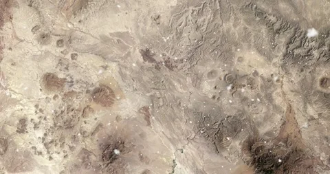 Ascending through falling snow over Rio Grande Valley. Two versions Stock Footage 268299388