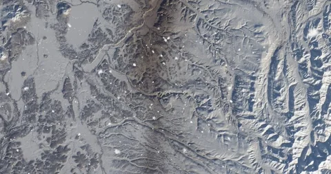 Ascending through falling snow over Kamchatka Peninsula, Russia. Two versions Stock Footage 268302820