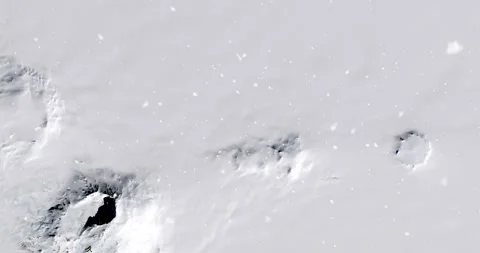 Ascending through falling snow over Mount Sidley, Antarctica. Two versions Stock Footage 268306485