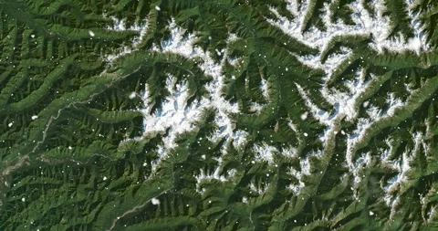 Ascending through falling snow over Olympic range Washington. Two versions Stock Footage 268306495