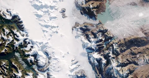 Ascending through falling snow over parts of the Patagonian alps. Two versions Stock Footage 268312563