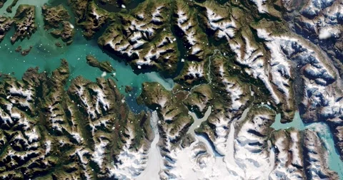 Ascending through falling snow over parts of the Patagonian alps. Two versions Stock Footage 268312565