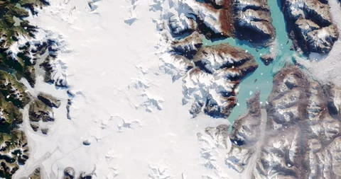 Ascending through falling snow over parts of the Patagonian alps. Two versions Stock Footage 268312571