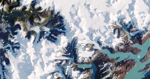Ascending through falling snow over parts of the Patagonian alps. Two versions Stock Footage 268318024
