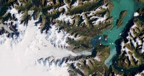 Ascending through falling snow over parts of the Patagonian alps. Two versions Stock Footage 268318029