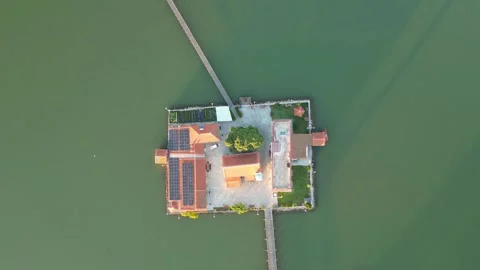 Ascending Top Down Drone Reveal of Porto Lagos Monasteries and Lagoon at Gol Stock Footage 340258310