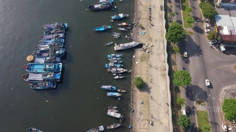 Ascending Top Down Drone View of Fishing Boats Along Da Nang Waterfront Stockbeeldmateriaal 340199110