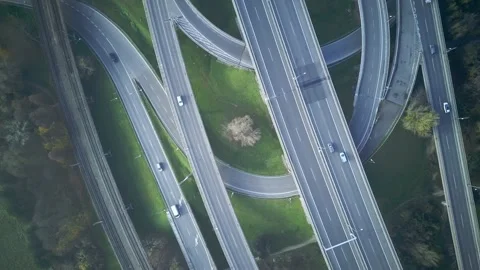 Ascending top view of a highway junction with some traffic Stock Footage 143806412
