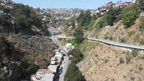 Ascending vertical pan over Florida Valparaíso hill Stock Footage 238787202