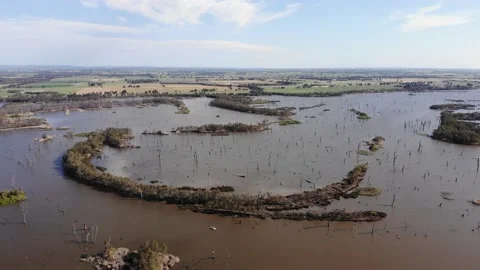 Ascending View Over Horseshoe Shaped Island Stock Footage 141013944