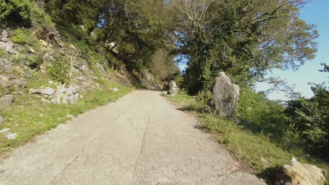 Ascent along the mountain path to the Anakopia fortress Stock Footage 164332381