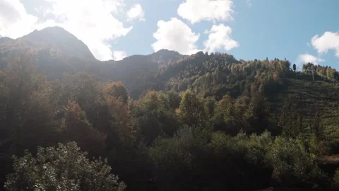 Ascent to the mountains by cable car. View of the mountain peaks. Stock Footage 221300483