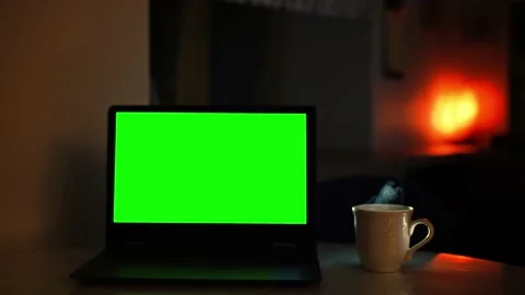 An ascetic corner for working at the computer at home with a cup of hot tea 库存影片 167784240