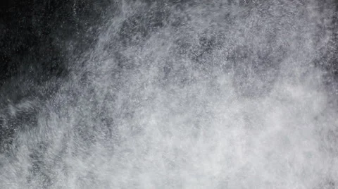 Ash explosion in front of black background, close up Видео 50455978