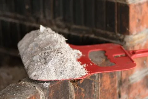 Ash on a red blade after burning wood Stock Photos