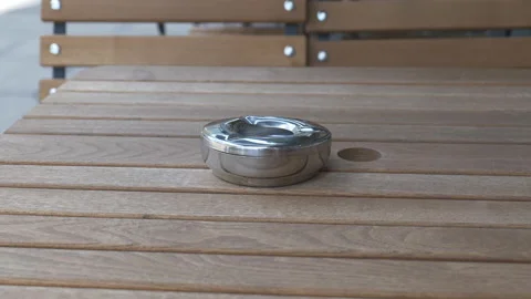 An ash tray on a table at a street cafe. Stock Footage 158711398