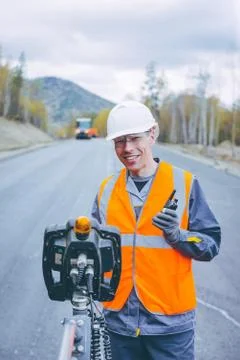 Ashalting nachine operator Stock Photos