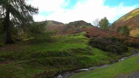 The Ashbrook River, in Carding Mill Valley, Shropshire  Stock Footage 321474844