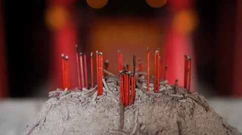 Ashes and candles of tools for praying in front of vihara or temple for buddh Stock Photos