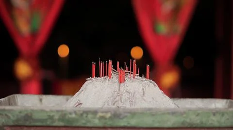 Ashes and candles of tools for praying in front of vihara or temple for buddh Stock Photos