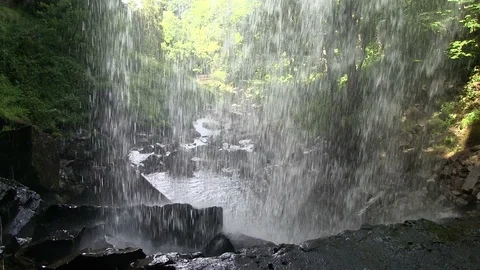 Ashgill Head waterfall viewed from behind Cumbria England UK Stock Footage 115433256