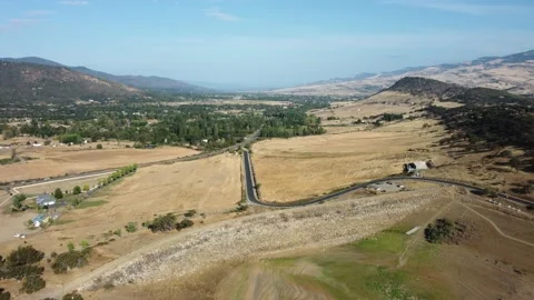 Ashland, OR, USA - Emigrant Lake - Flying northwest over dam at 400ft Stock Footage 211123783