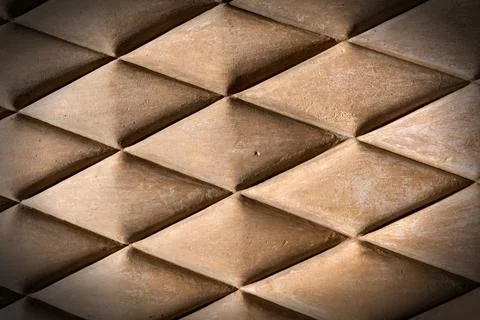 Ashlar - Wall Made of Brown Blocks of Stones in the Shape of a Rhombus Stock Photos