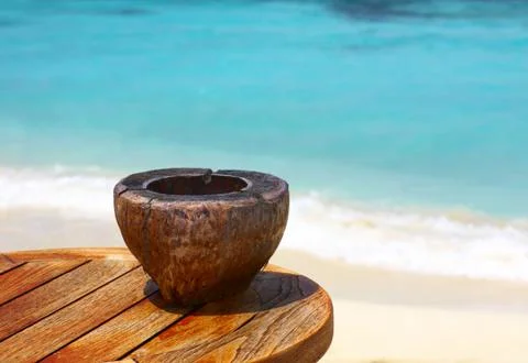 Ashtray on a beach table 스톡 사진