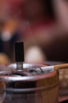 Ashtray with cigarette Stock Photos